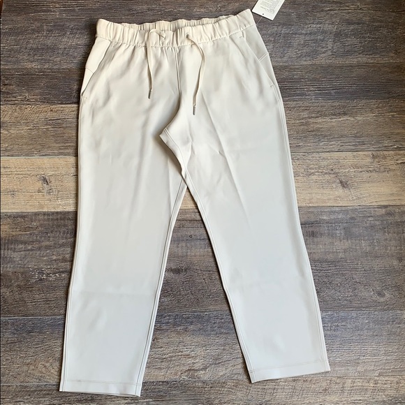 lululemon athletica Pants - NWT On the Fly 7/8 Pants Woven (10, Cream)